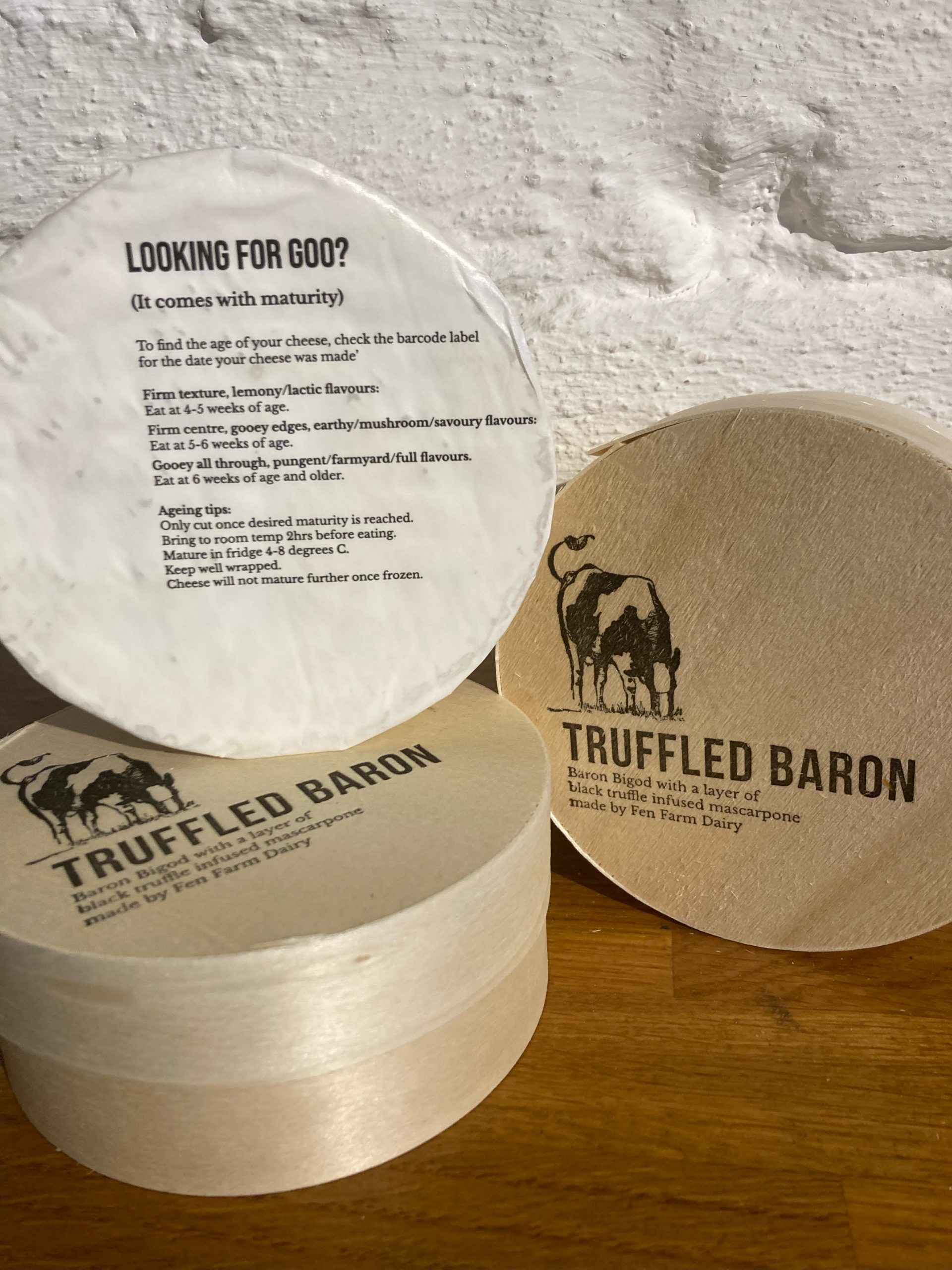 Three round boxes of baby truffle baron bigod piled up