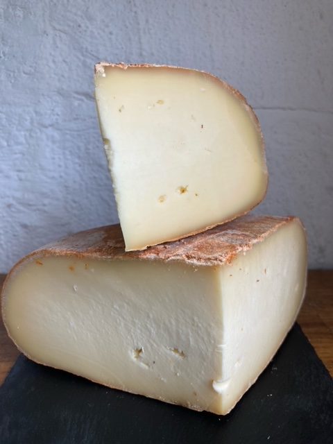 Two pieces of Spanish Cured Manchego cheese